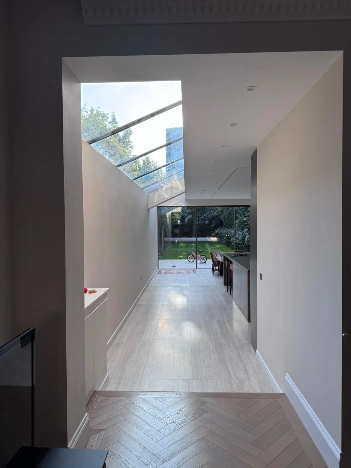 Internal corridor with sloped rooflight leading to the kitchen extension, Chiswick