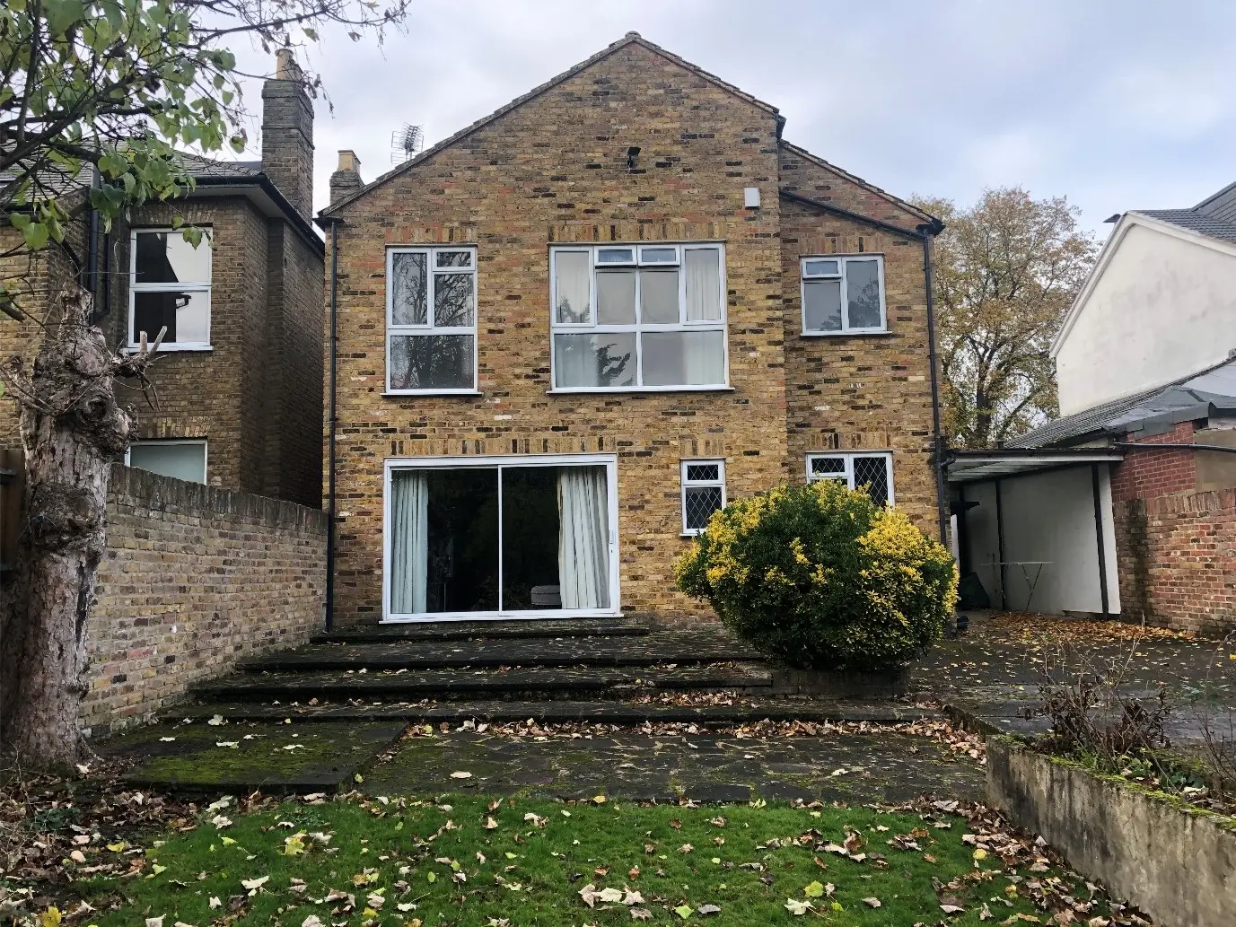 Rear of the existing house on Hanworth Road before extension and conversion to flats